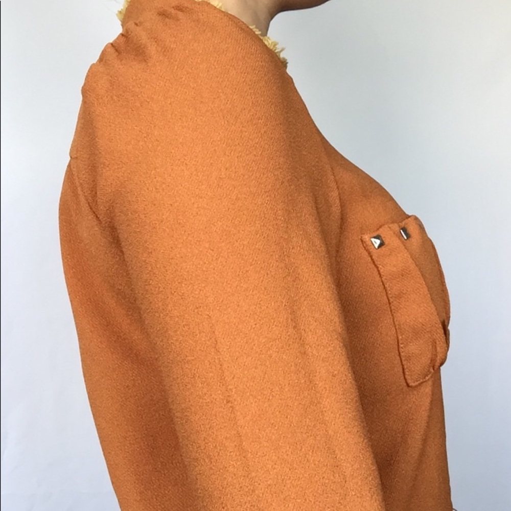 Orange button down shirt